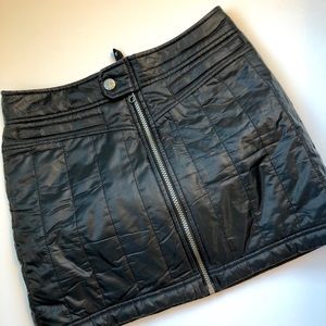 Athleta black zip up, cold weather skirt.